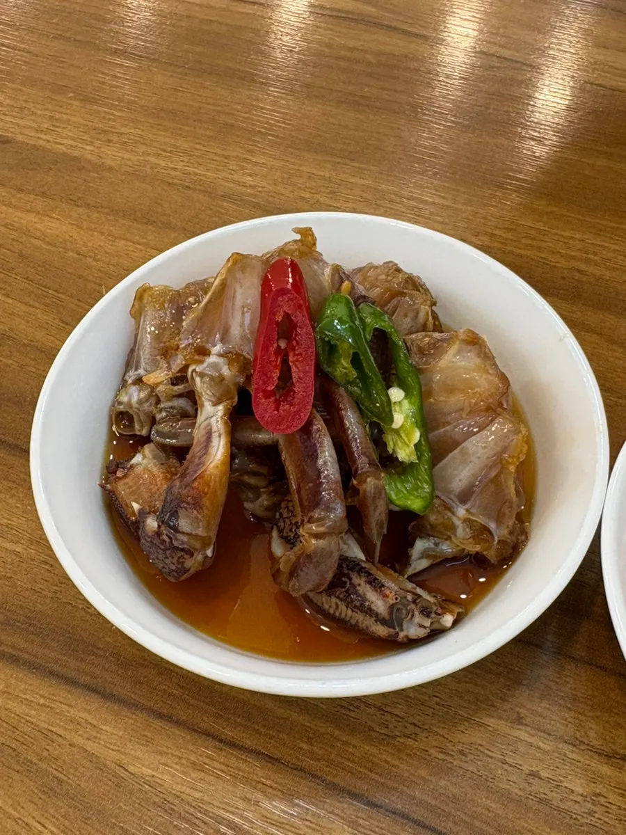 Soy-marinated crab served as a side dish