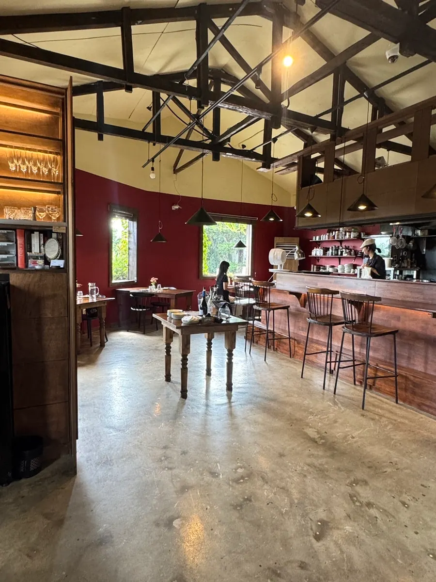 Interior of Nansan-ri Restaurant with high ceiling and red walls