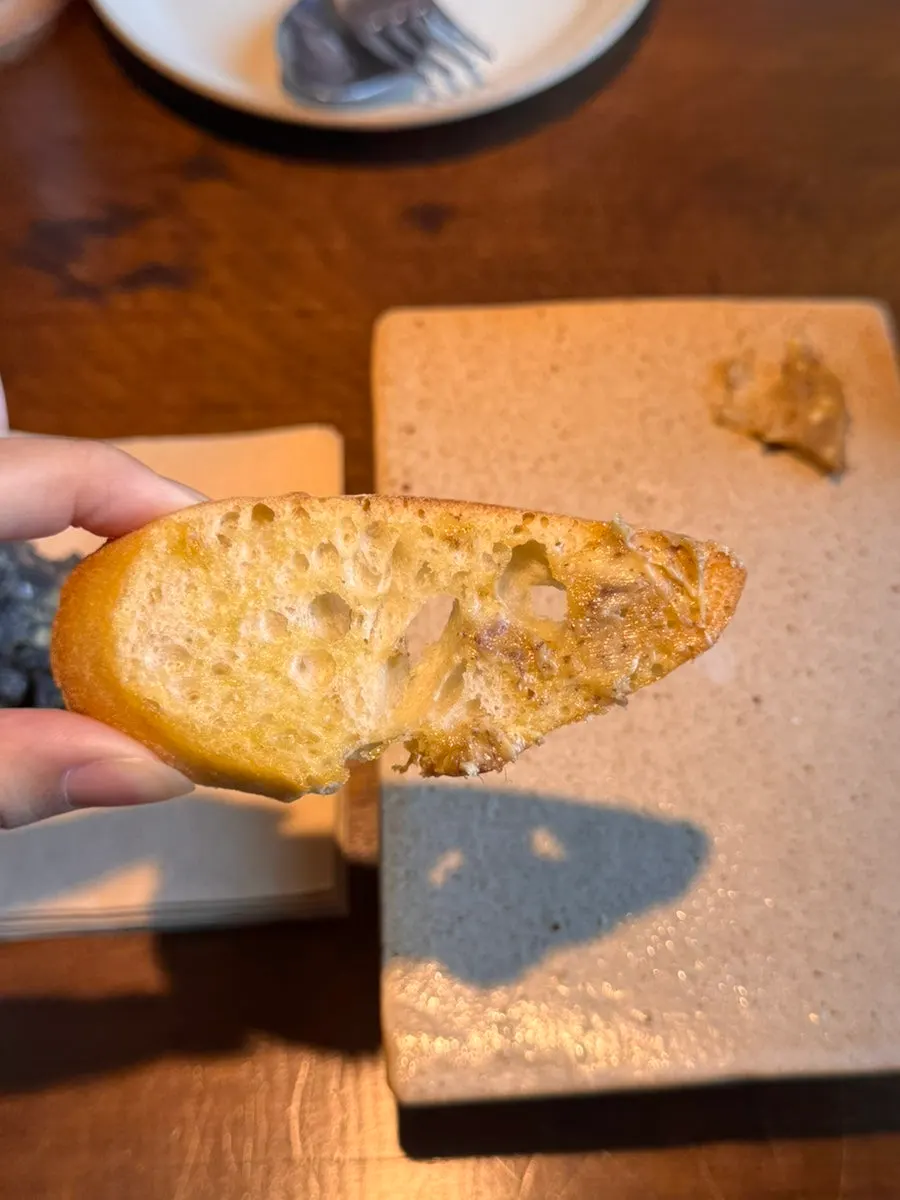 Baguette spread with house-made fern butter