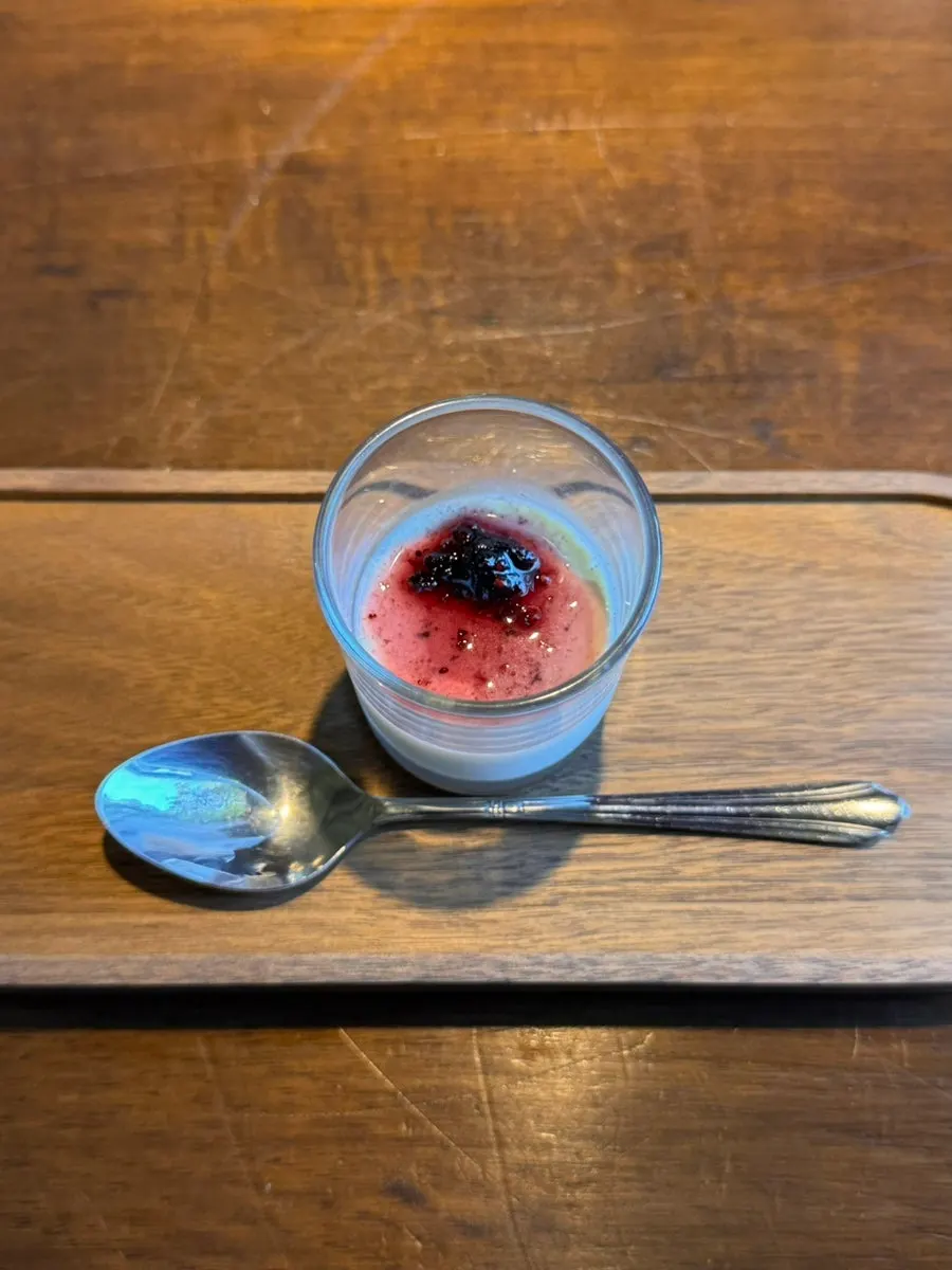 House pickles served alongside the pasta