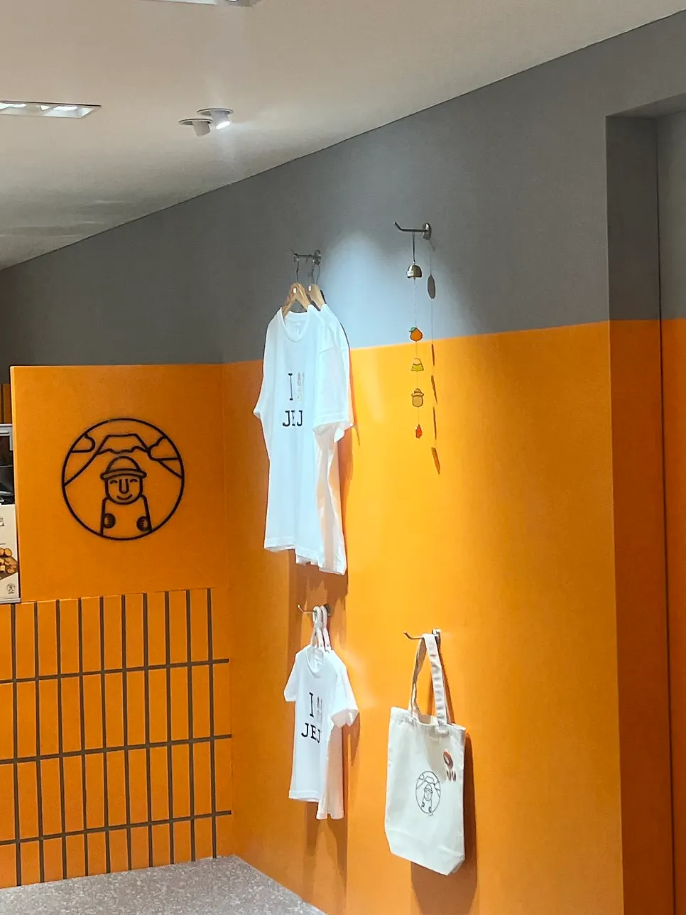 Orange-decorated interior of Today Jeju store