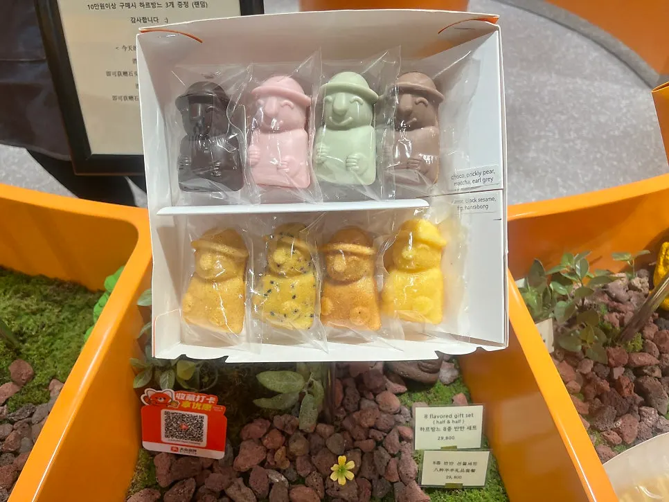Packaged madeleine sets on display in the store