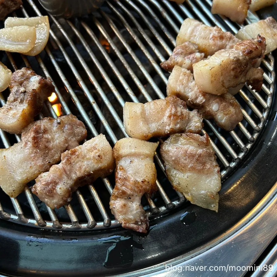 Black pork cooking on the grill plate