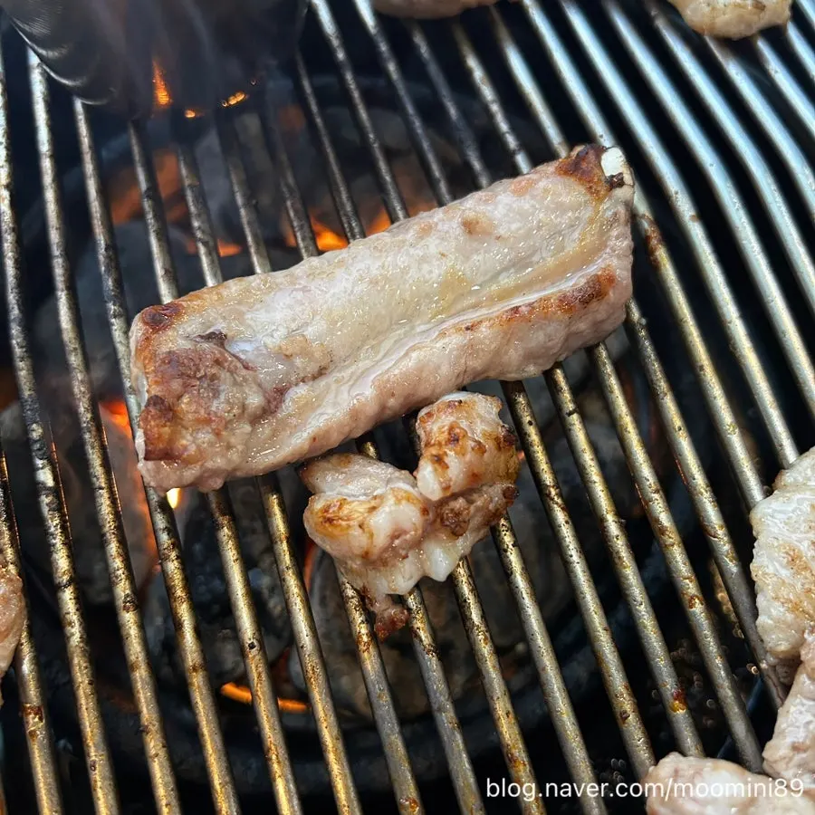 Black pork raw ribs on the grill