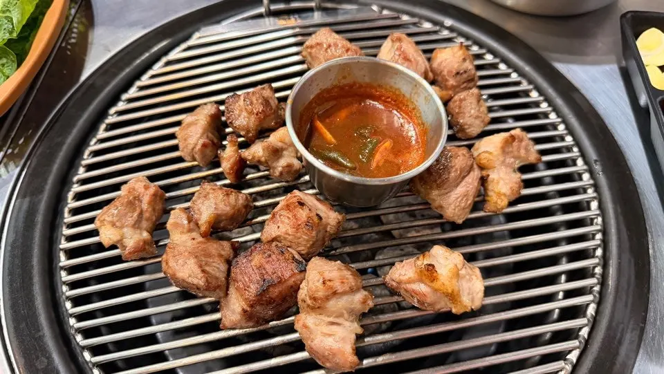 Browned black pork grilled and cut into bite-sized pieces