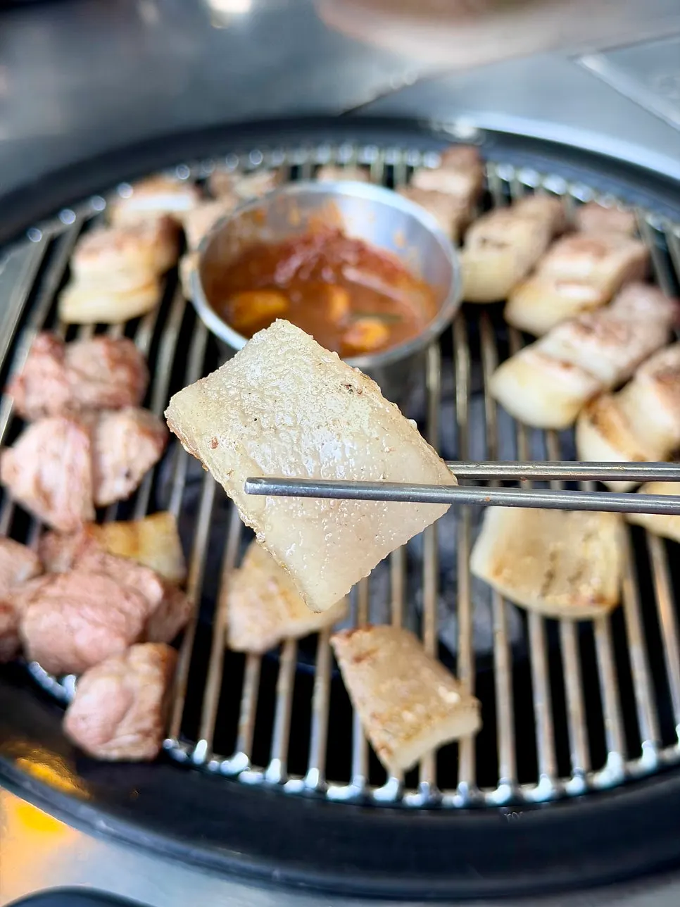 Chewy grilled black pork skin