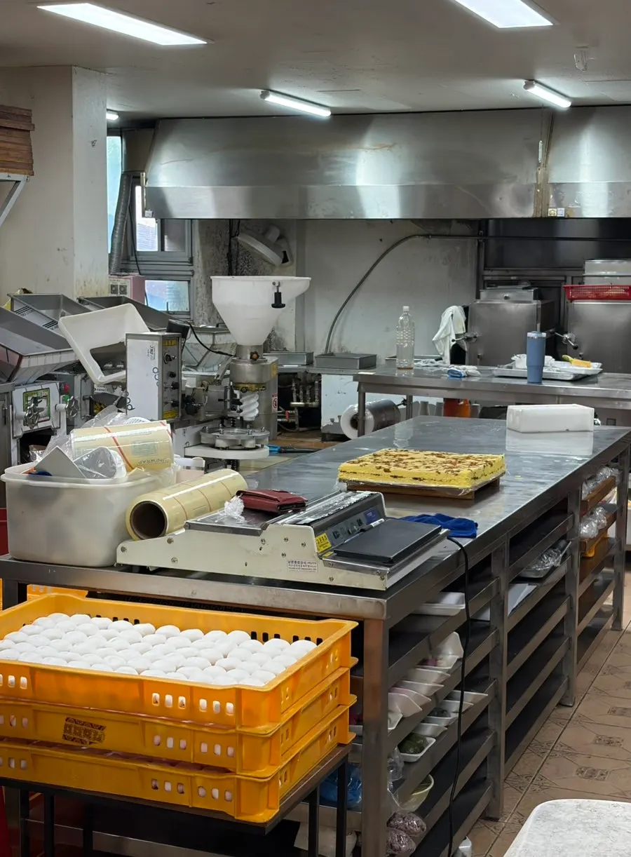 Rice cake shop interior with the work area visible at the back