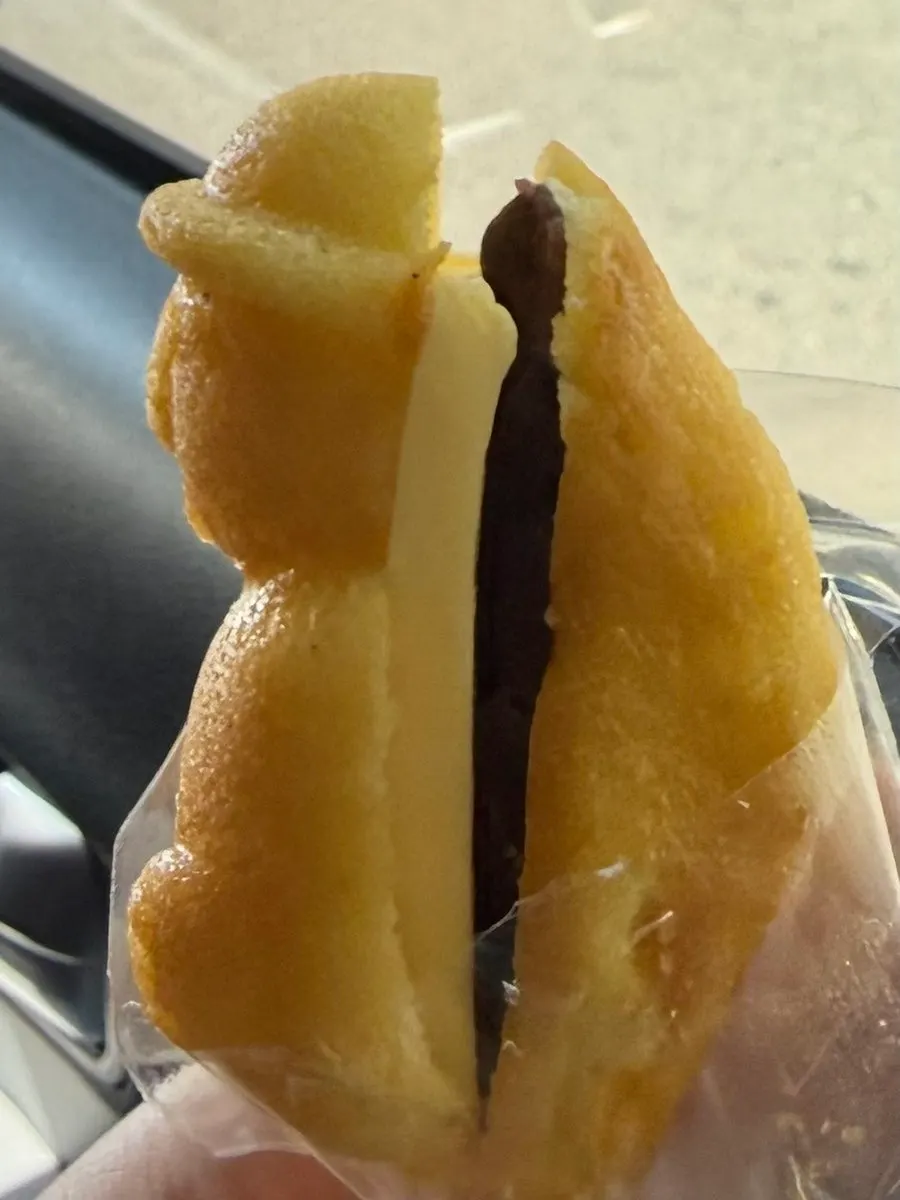 Cross-section of the ang-butter madeleine with red bean and butter