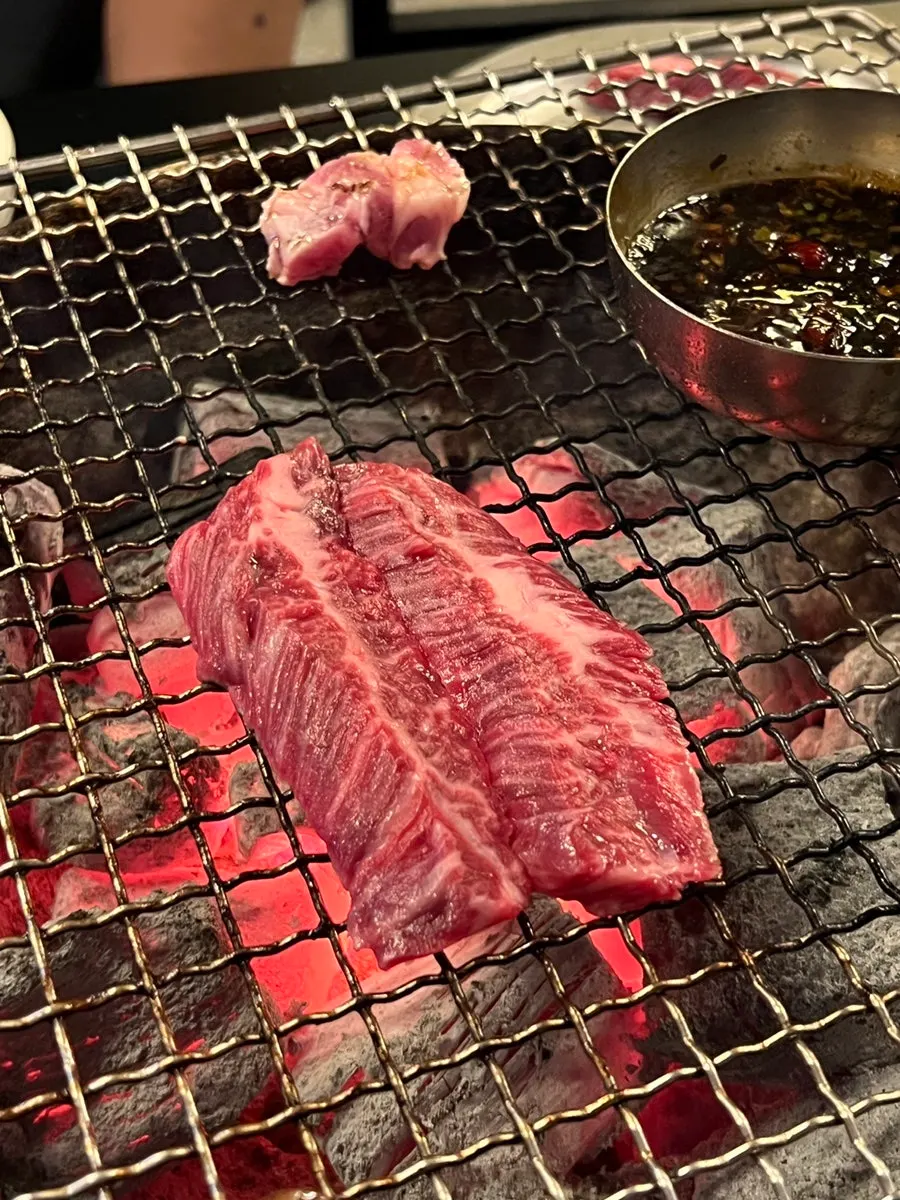 Brisket cooking on the grill