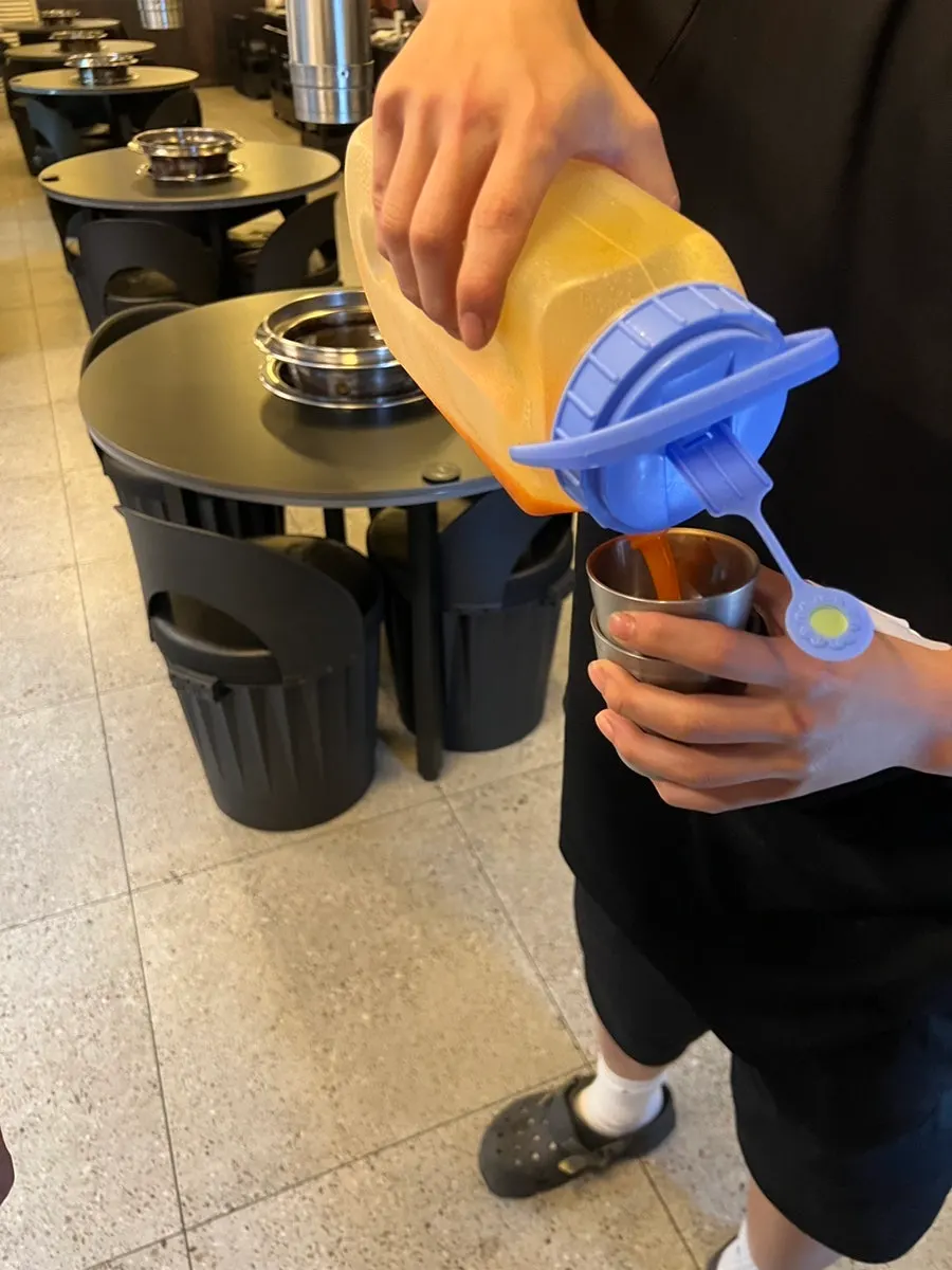Homemade carrot juice served at the end of the meal