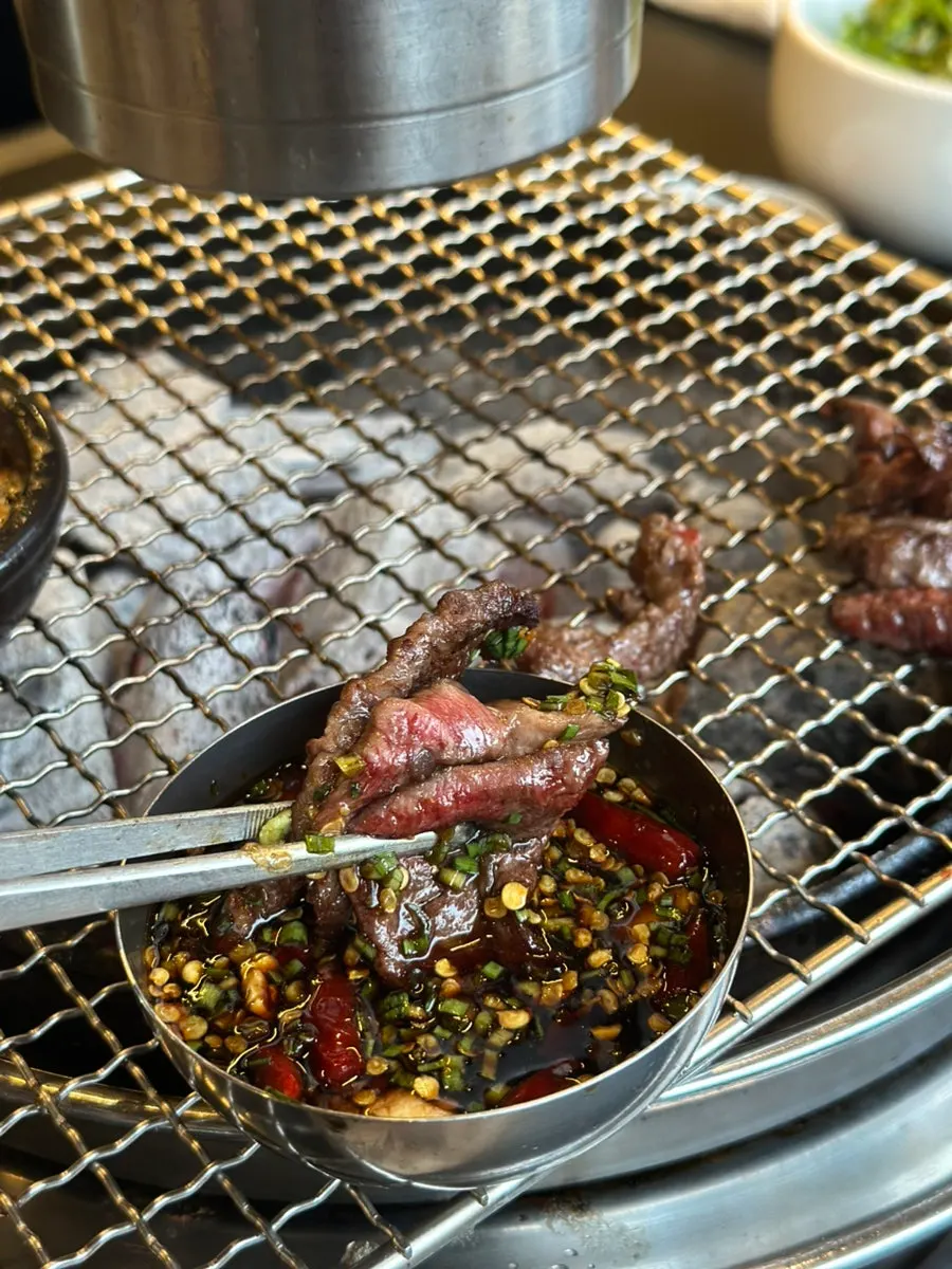 A piece of galbisal with garlic and butter
