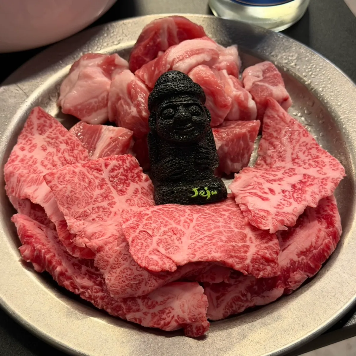 Signature charcoal grill photo at Dolgyeok Hanwoo in Yeondong, Jeju