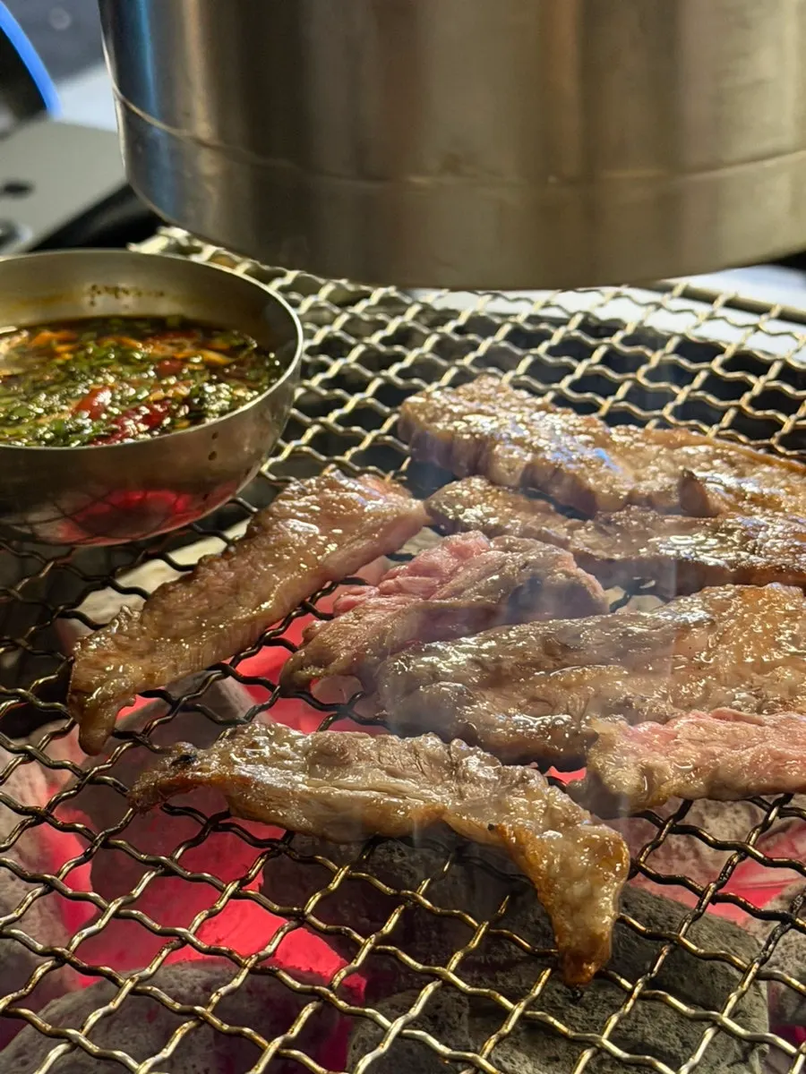 Galbisal cooking over charcoal