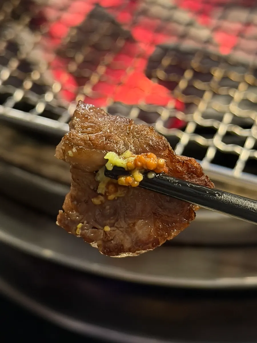 Grilled galbisal served alongside drinks