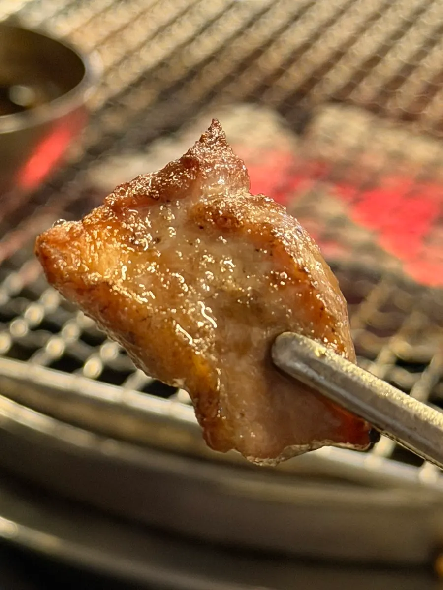 Golden-brown grilled black pork cubed pork jowl