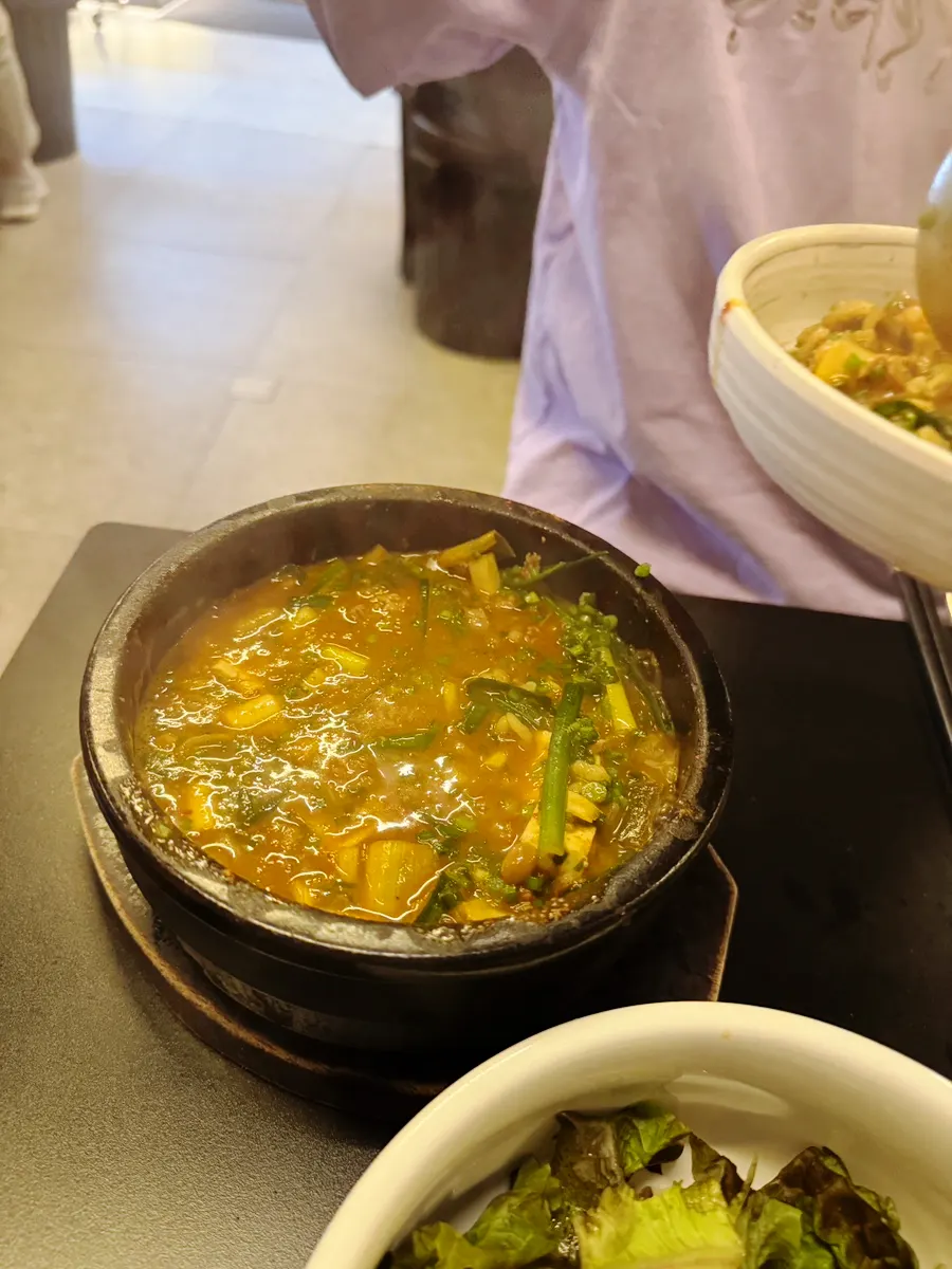 Doenjang sulbap bubbling in a stone pot