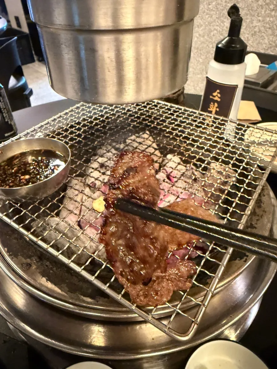 Manong galbisal grilling over charcoal