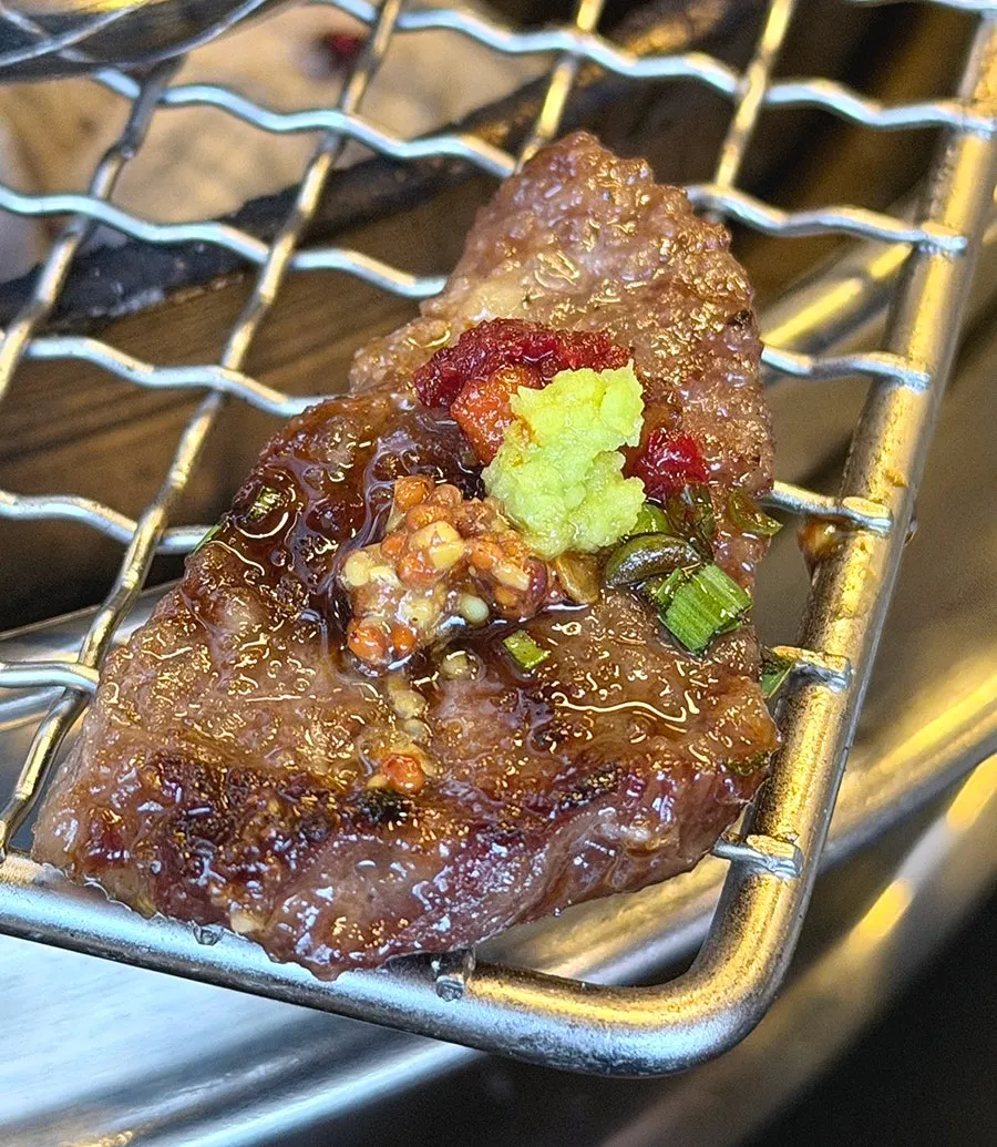 Meat combined with sauce and wasabi