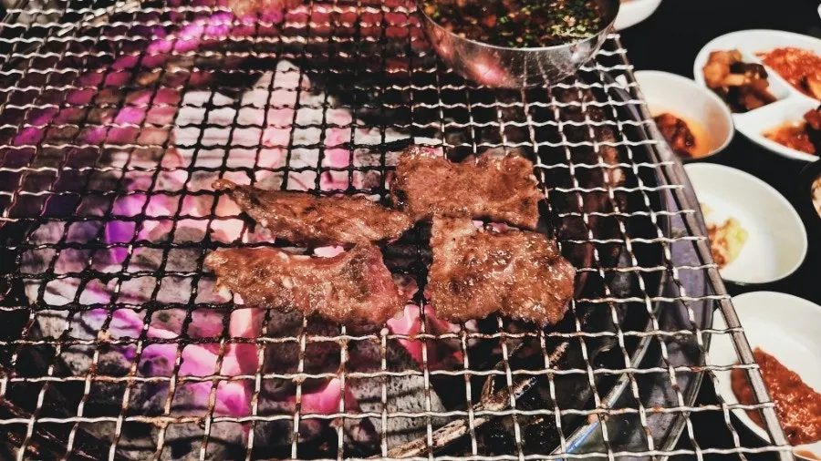 Manong galbisal cooking on the grill