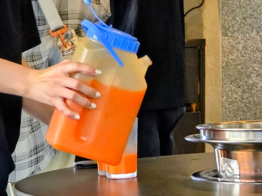 Carrot juice served after the meal