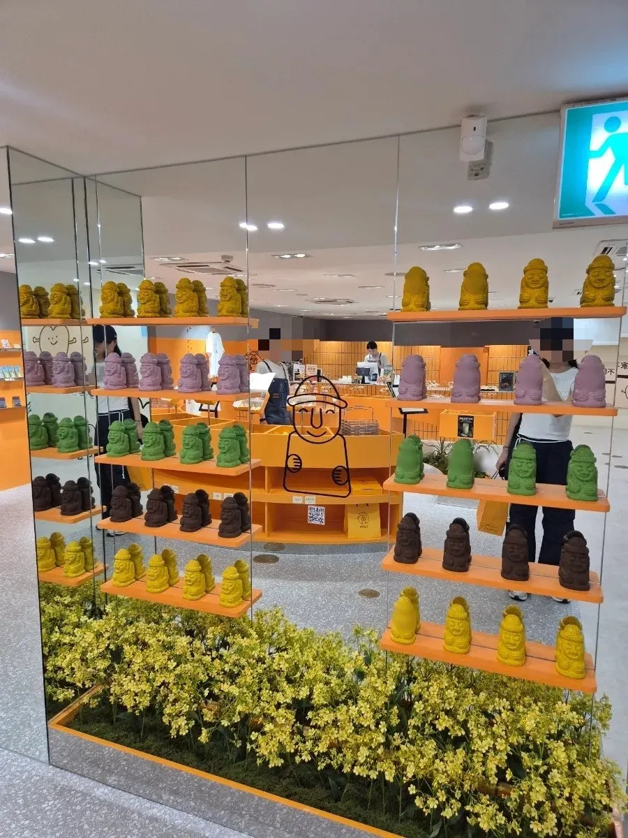 Colorful Jeju dessert packaging on display