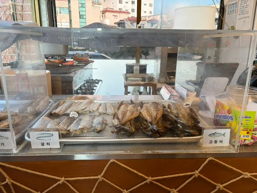 Interior of the restaurant with the smell of grilled fish