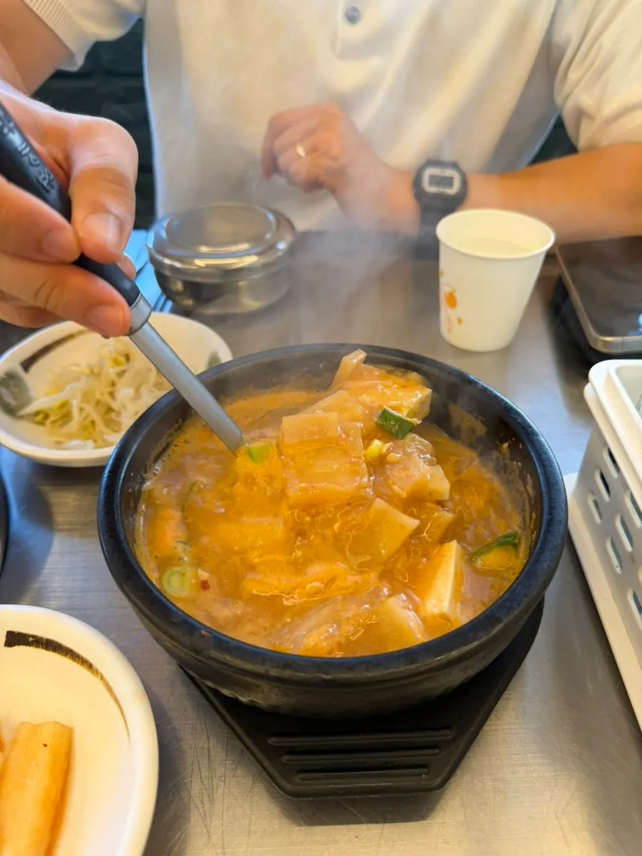Cheonggukjang served alongside the grilled fish