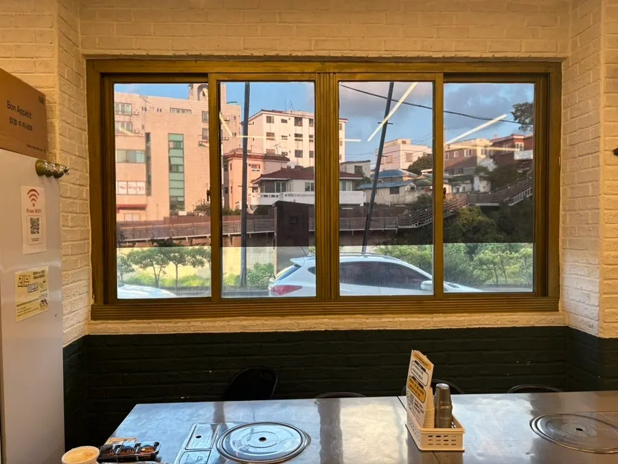 Window seat with a sunset view outside the restaurant