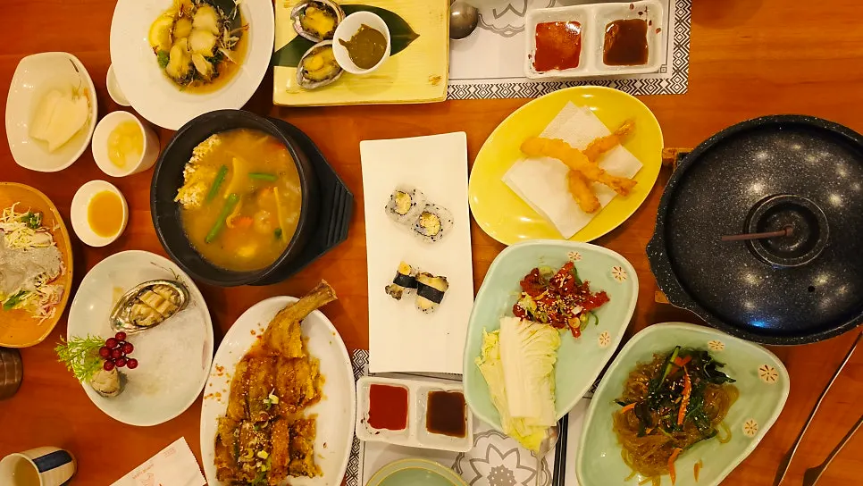 Hanjeongsik spread with abalone dishes and side dishes