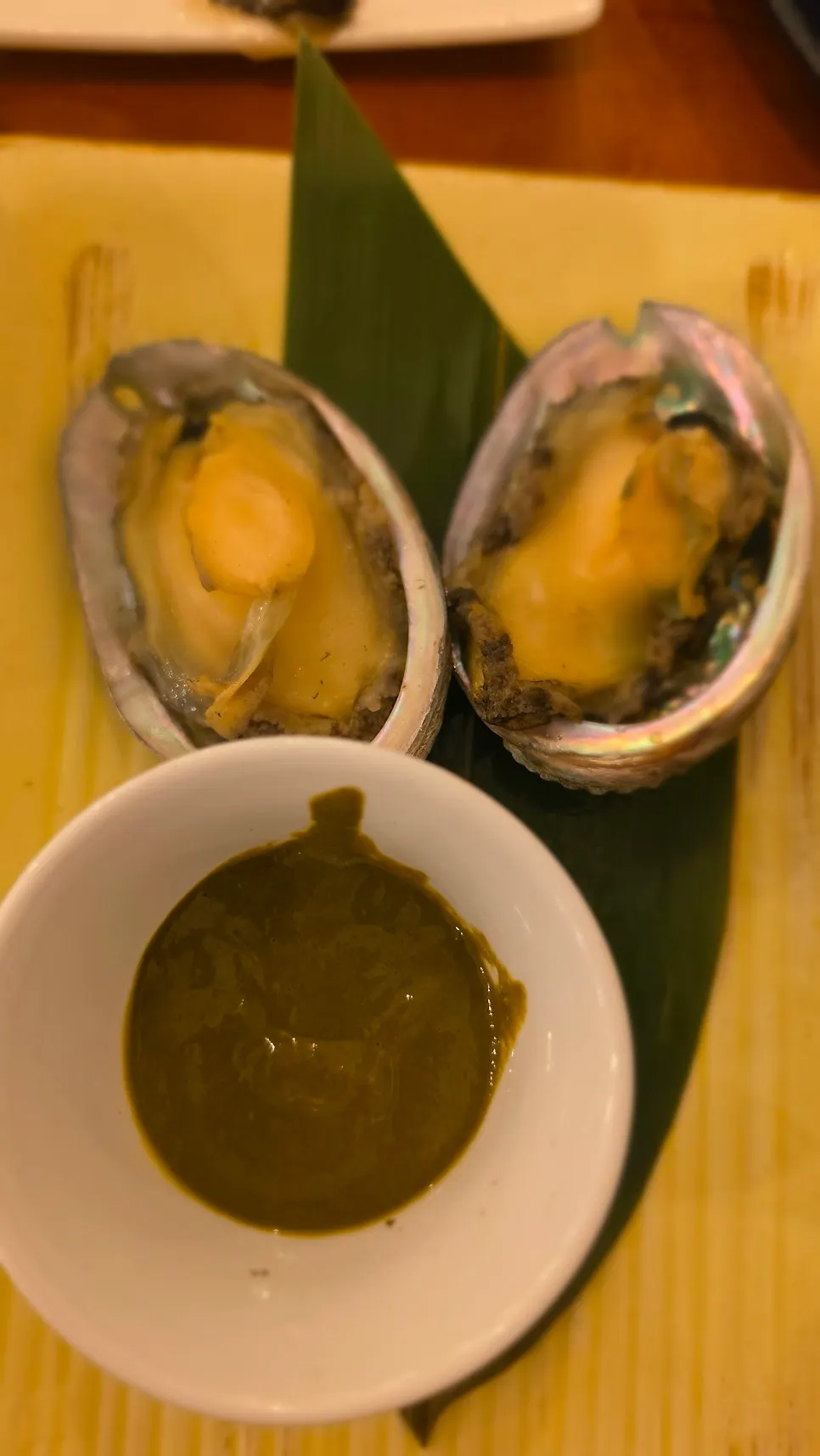 Abalone dish served with abalone entrail sauce