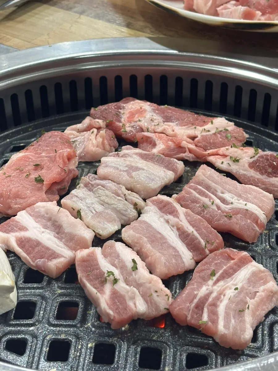 Plate of pork neck and fresh pork belly, one geun