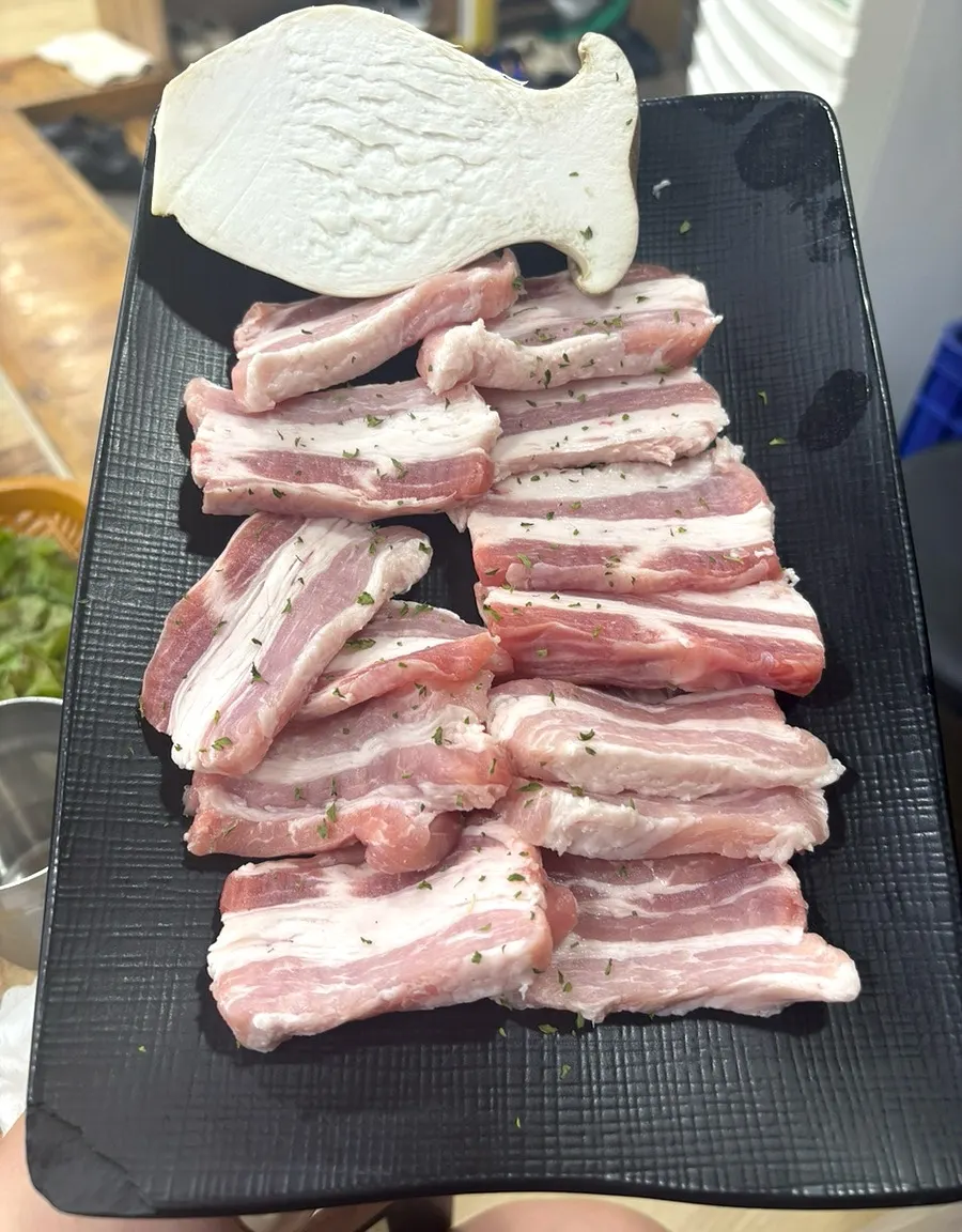 Cross-section of tender cooked pork neck