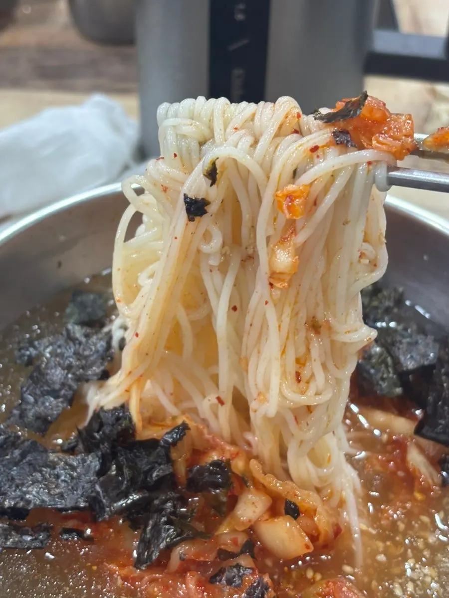 Cool kimchi noodles ordered to finish the meal
