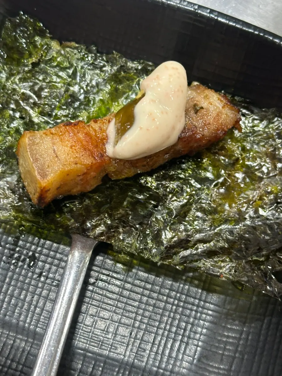 Mentaiko mayo and pickles added on top of gim and meat