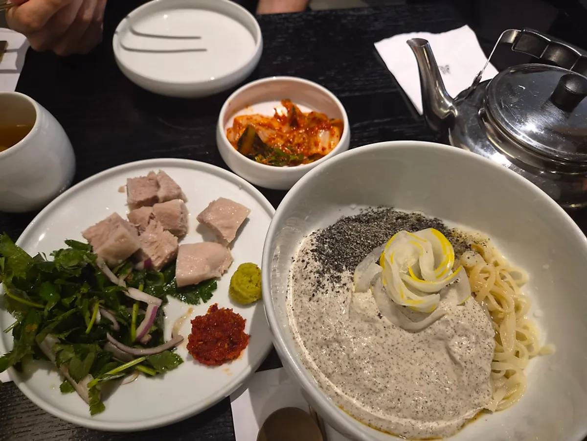 Tanbaek's soybean bibim kalguksu and onjeyuk combo spread