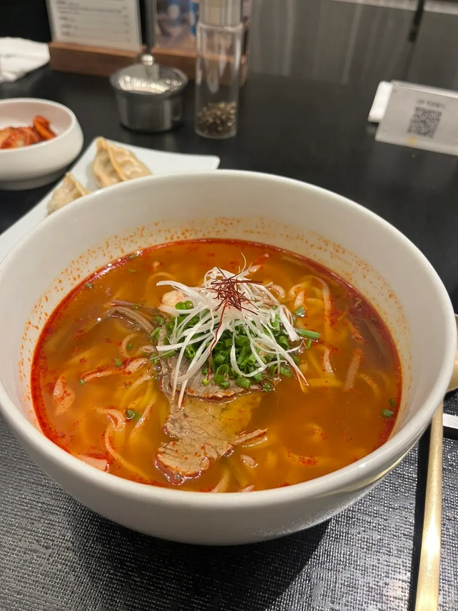 Spicy dadegi served alongside the kalguksu