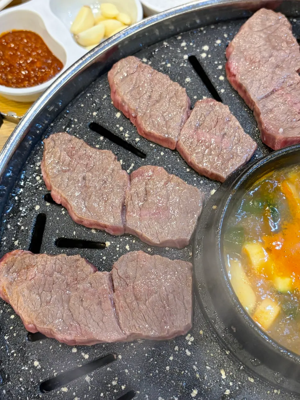 Beef cooking on the grill
