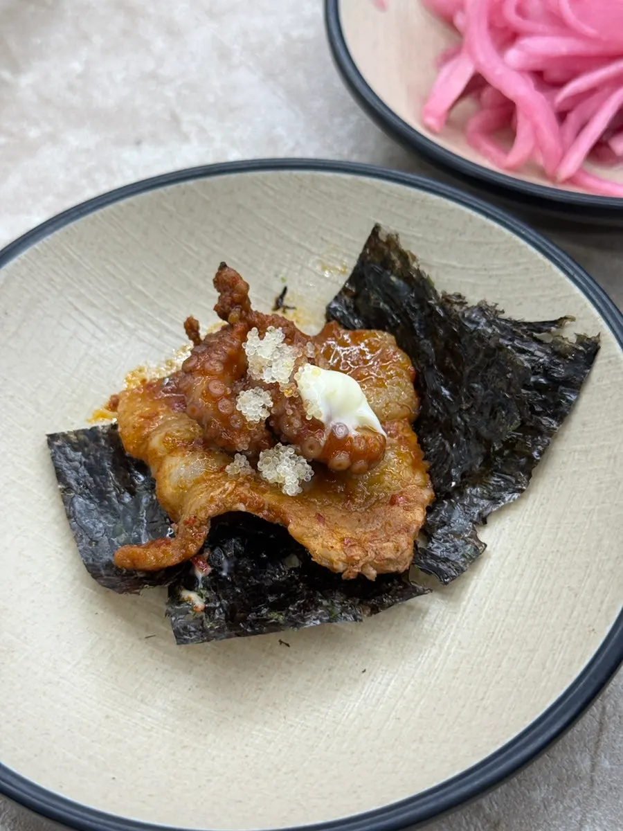 Plump cooked jjukkumi with minari