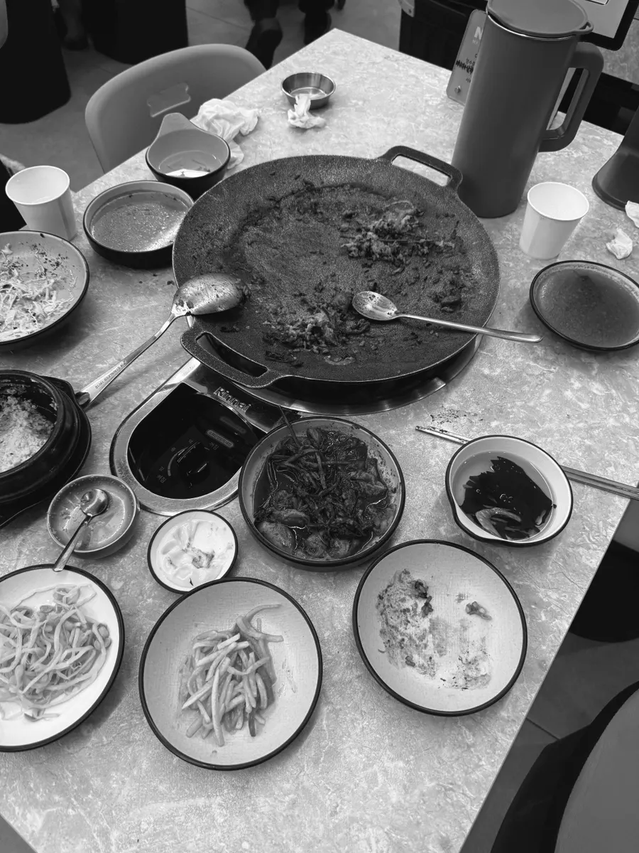 Empty griddle and fried rice plate after finishing the meal