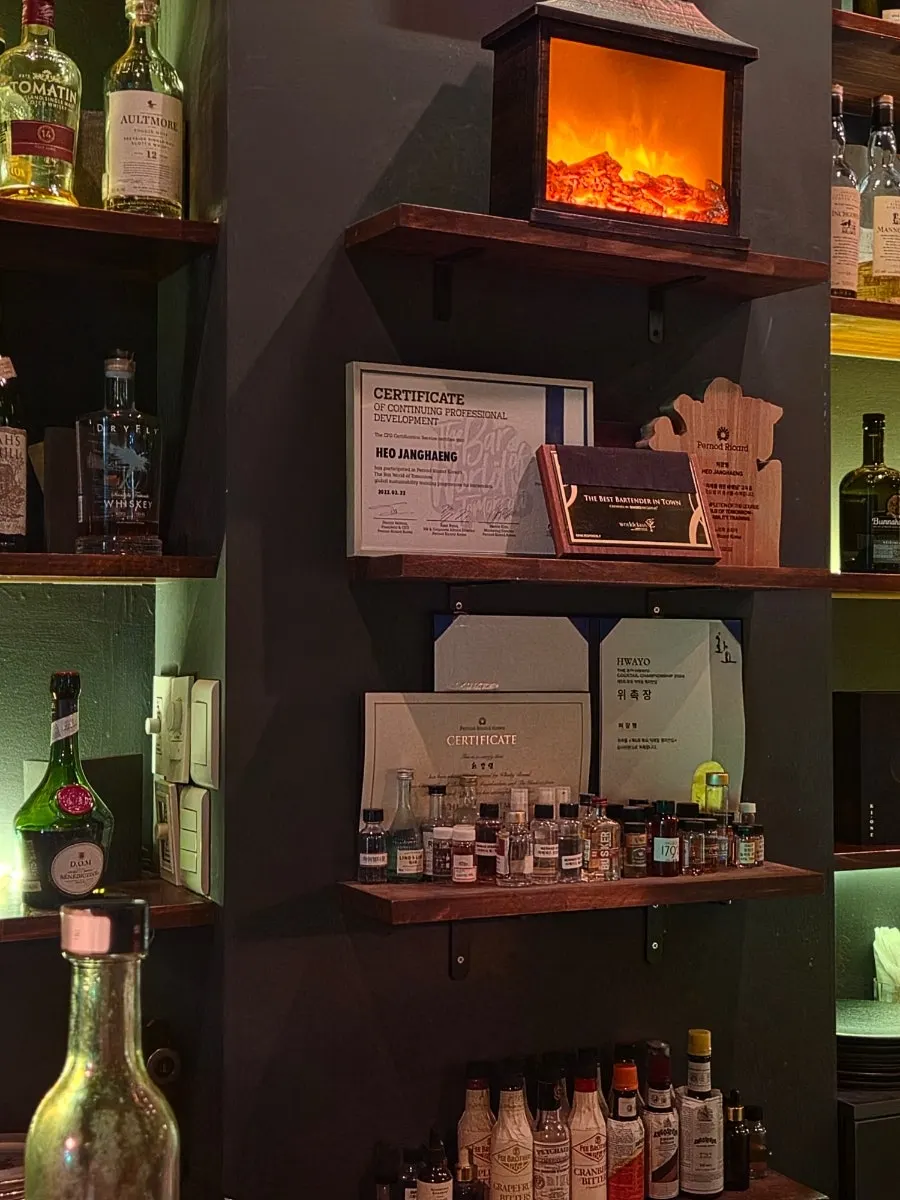 Liquor display wall complete with a ladder
