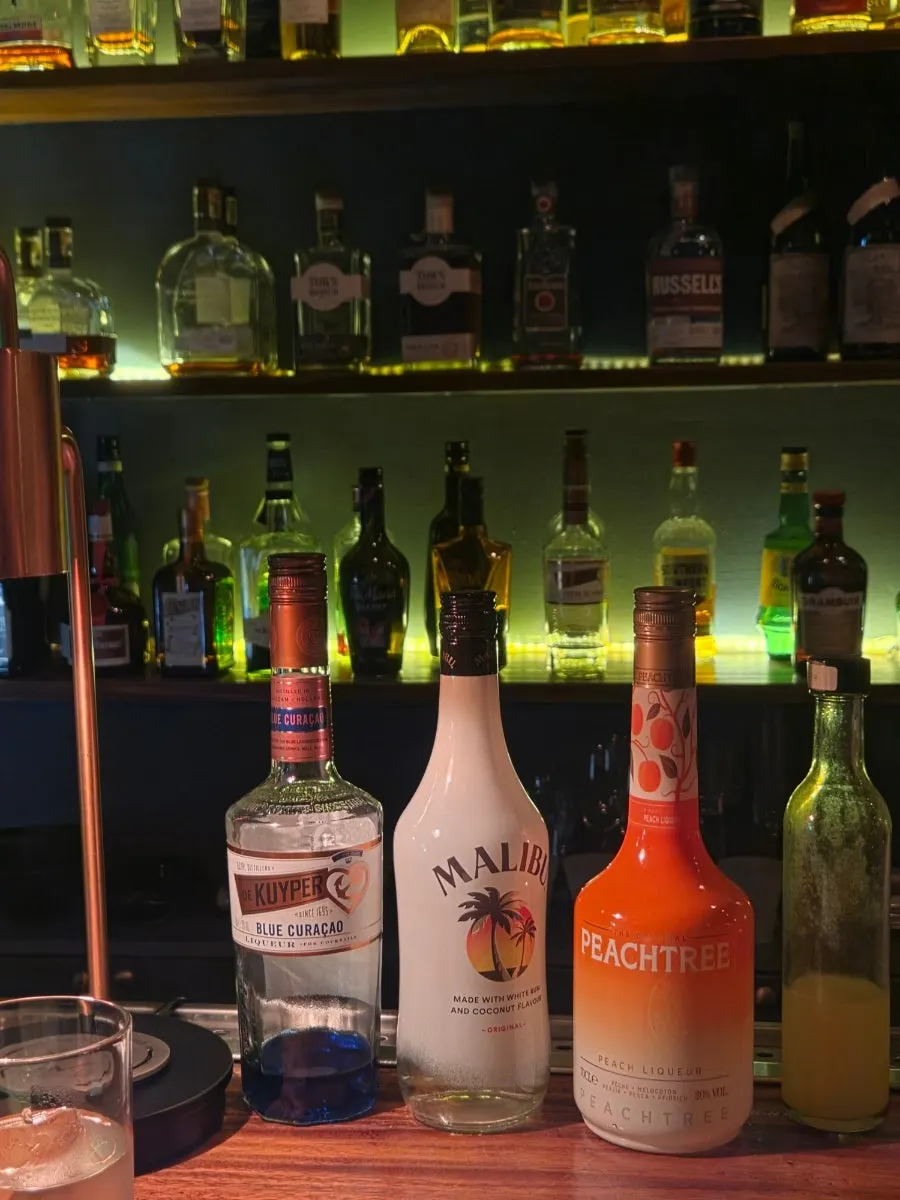 The cocktail-making process happening right in front of you