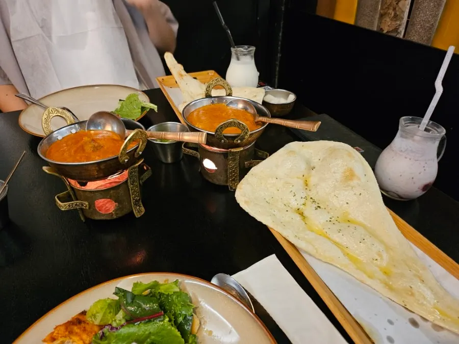 A bowl of Kari's butter chicken curry