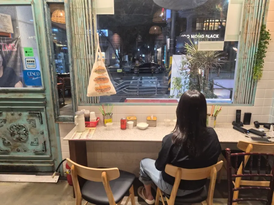 Restaurant interior continuing the Vietnamese atmosphere