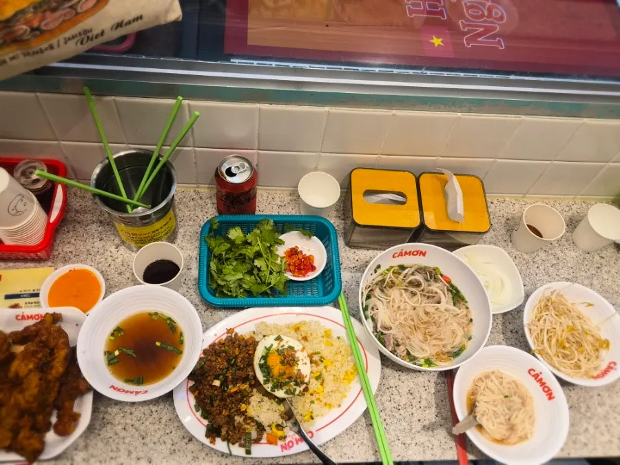 Ordering Kkamon pho, fried rice, and fried chicken neck meat