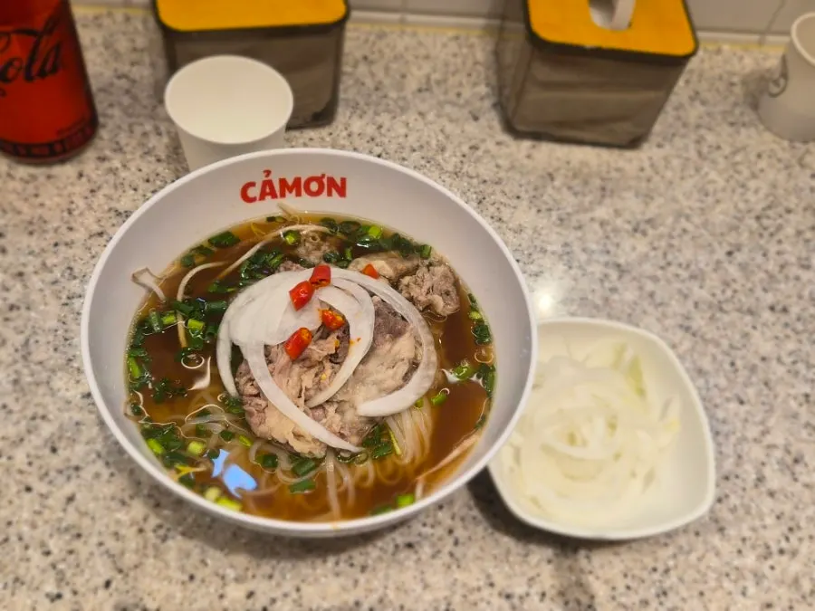 Ordered Kkamon pho and side dishes