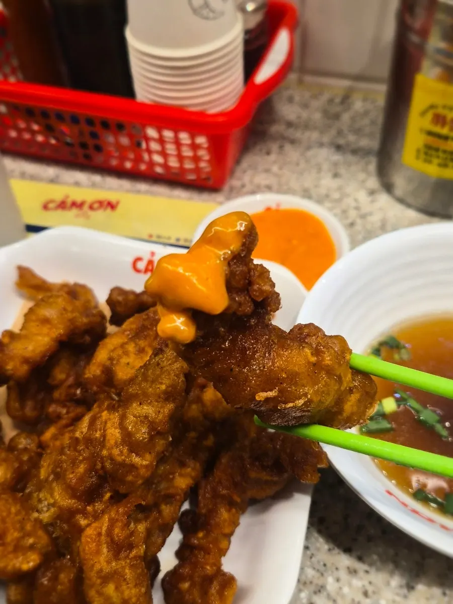 Fried chicken neck meat served with pho broth