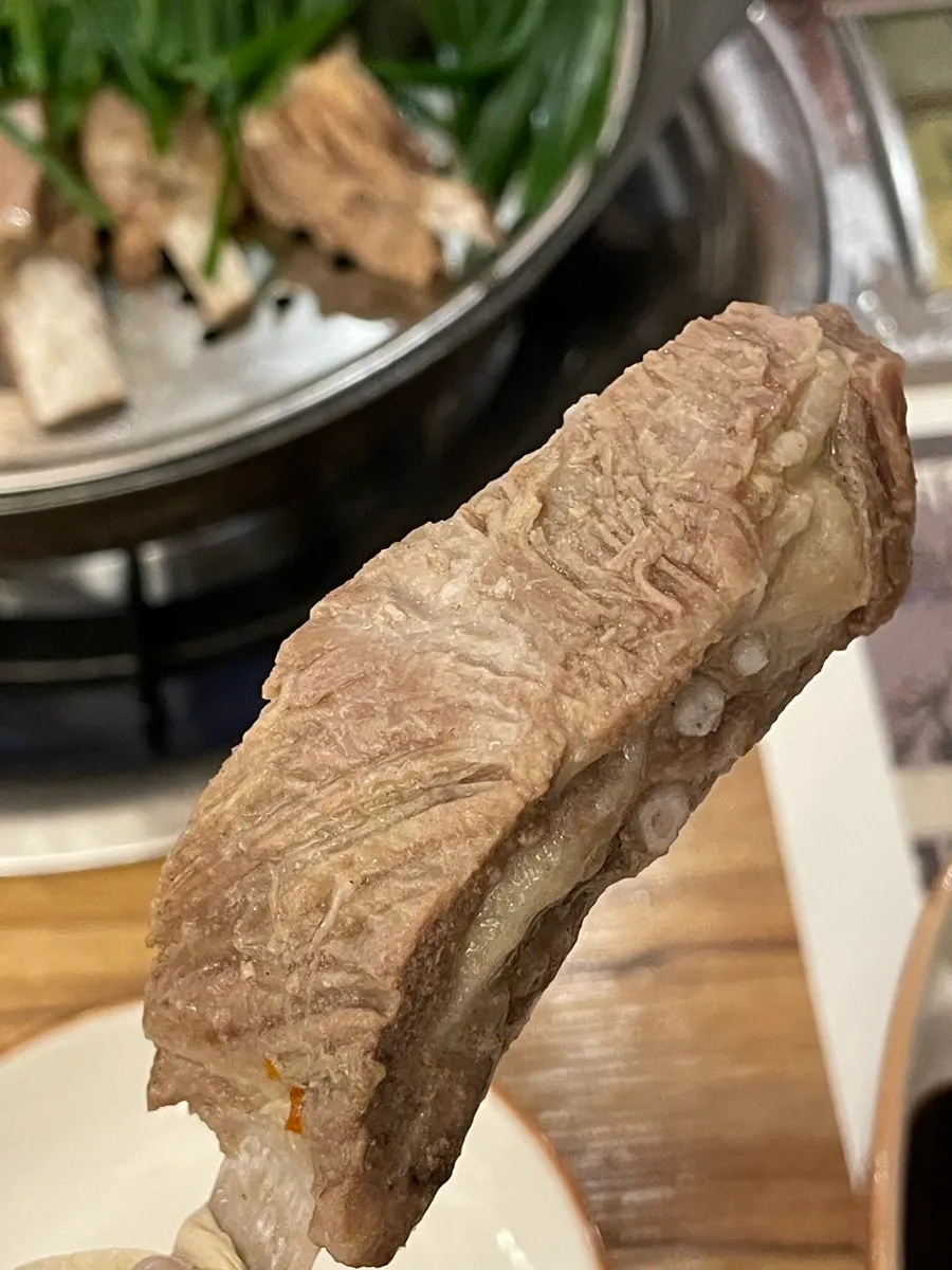 Close-up of tender, fully-boiled lamb ribs