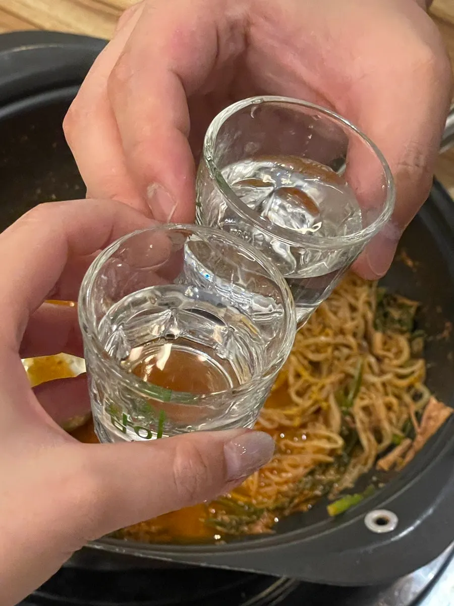 A spoonful of the spicy hangover hot pot broth