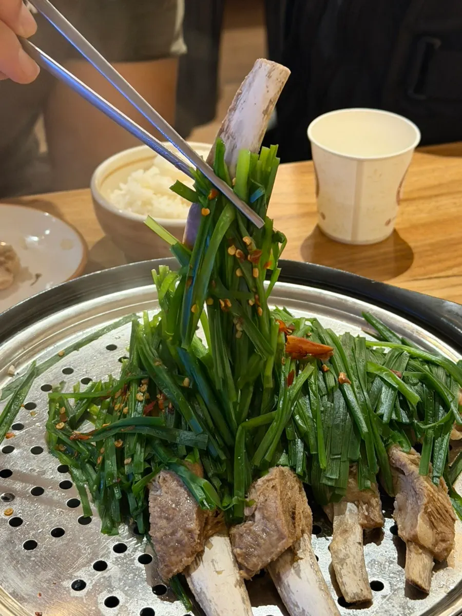 Boiled lamb ribs with fresh kimchi salad