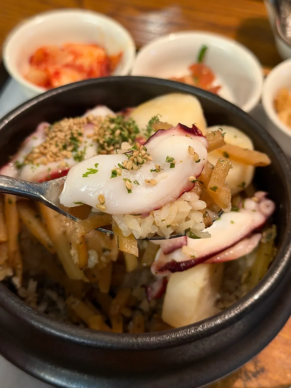 Spoonful of rice and potato scooped together